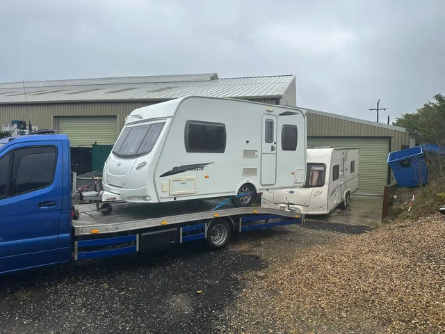 Touring caravan loaded for transport